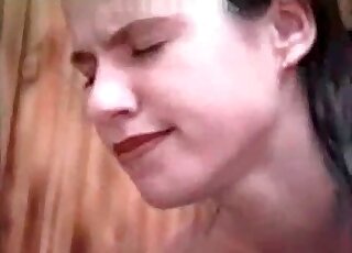 Brunette happily lets this pooch fuck her